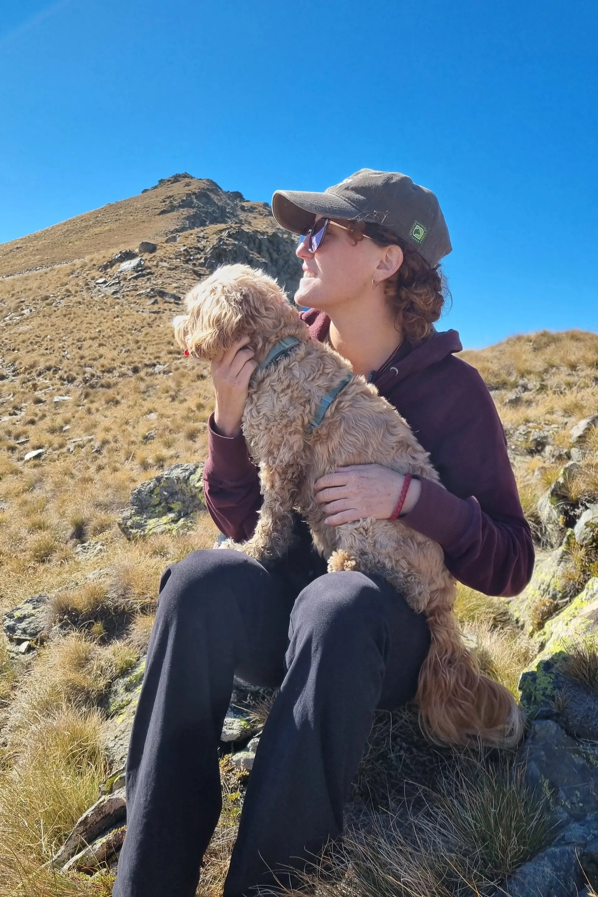 Roxy Henley with her dog in a calm therapy space